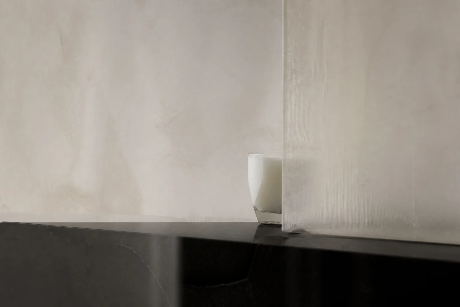 Provisional Dulce material study: an obscured pale drink behind translucent resin